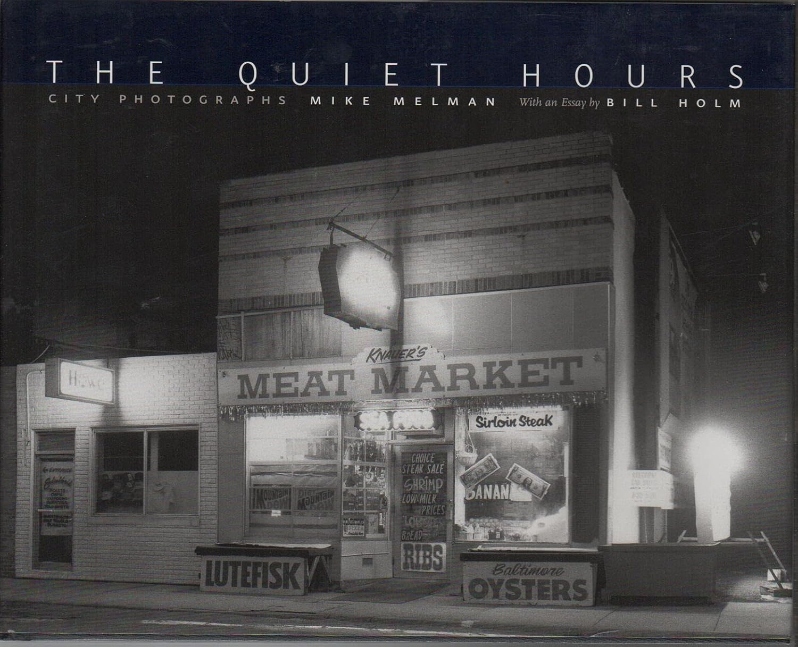 Product Description: A visual tribute to the industrial spaces and commercial interiors of Minnesota’s prewar era</br></br>A milling district along the Mississippi River. A railroad bridge on Washington Avenue. Jim’s Hamburgers in Duluth. A spiral staircase in the Schmidt Brewery. These are the spaces that capture the moods of Minnesota’s prewar era. These are the everyday places where ordinary people lived and worked. These are the images that show us the remnants of a city’s past.</br></br>InThe Quiet Hours, Mike Melman records a vanishing era of Minnesota’s towns and cities through a series of seventy black-and-white photographs taken from 1985 to 2002. Working in the half-light of predawn hours, Melman brings a new perspective to familiar places, one shaped by his training as an architect and his particular affinity for old buildings. Melman’s atmospheric photographs give us insight into the bygone life of a city where we had not thought to look for one before.</br></br>In his essay, Bill Holm compares Melman’s work to that of Walt Whitman and Carl Sandburg, artists who embrace and celebrate the urban experience. Holm writes, “These photographs take us a long way toward an understanding of that mighty heart of a city. . . . These are very American pictures in their stubbornness, their integrity, and their dogged affection for the working-class life buried inside them.”</br></br>Through his artistic and historic images, Melman exposes the speed at which American cities change and presents a gritty yet contemplative portrait of urban Minnesota.</br> The Quiet Hours